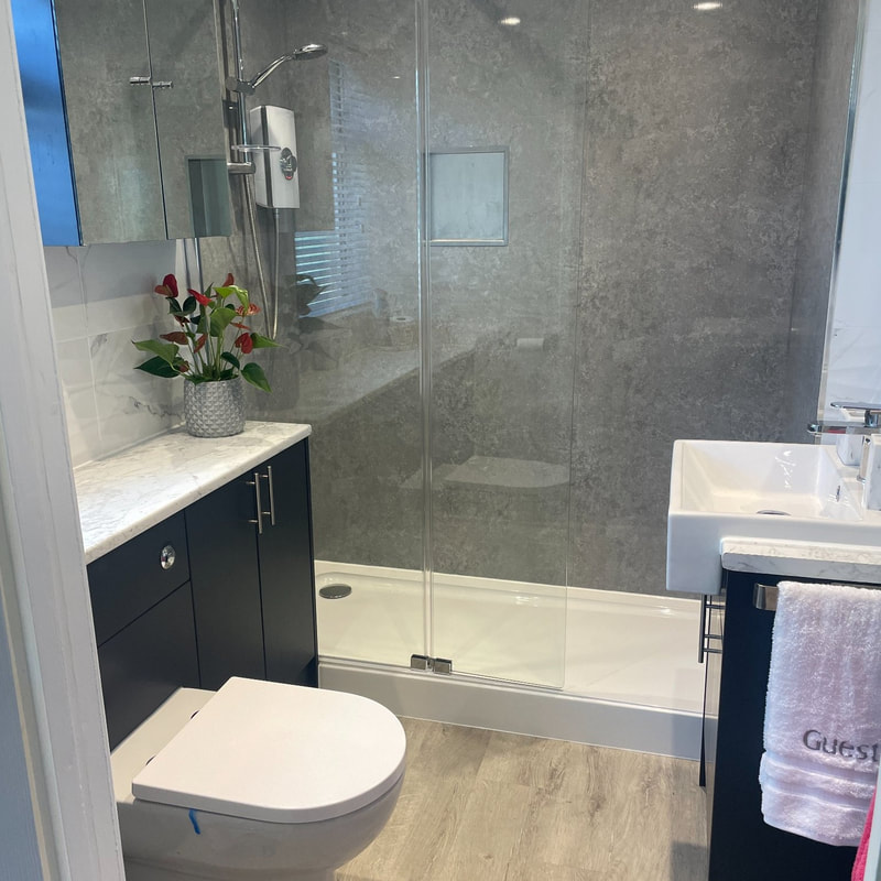 professional tiled shower room area